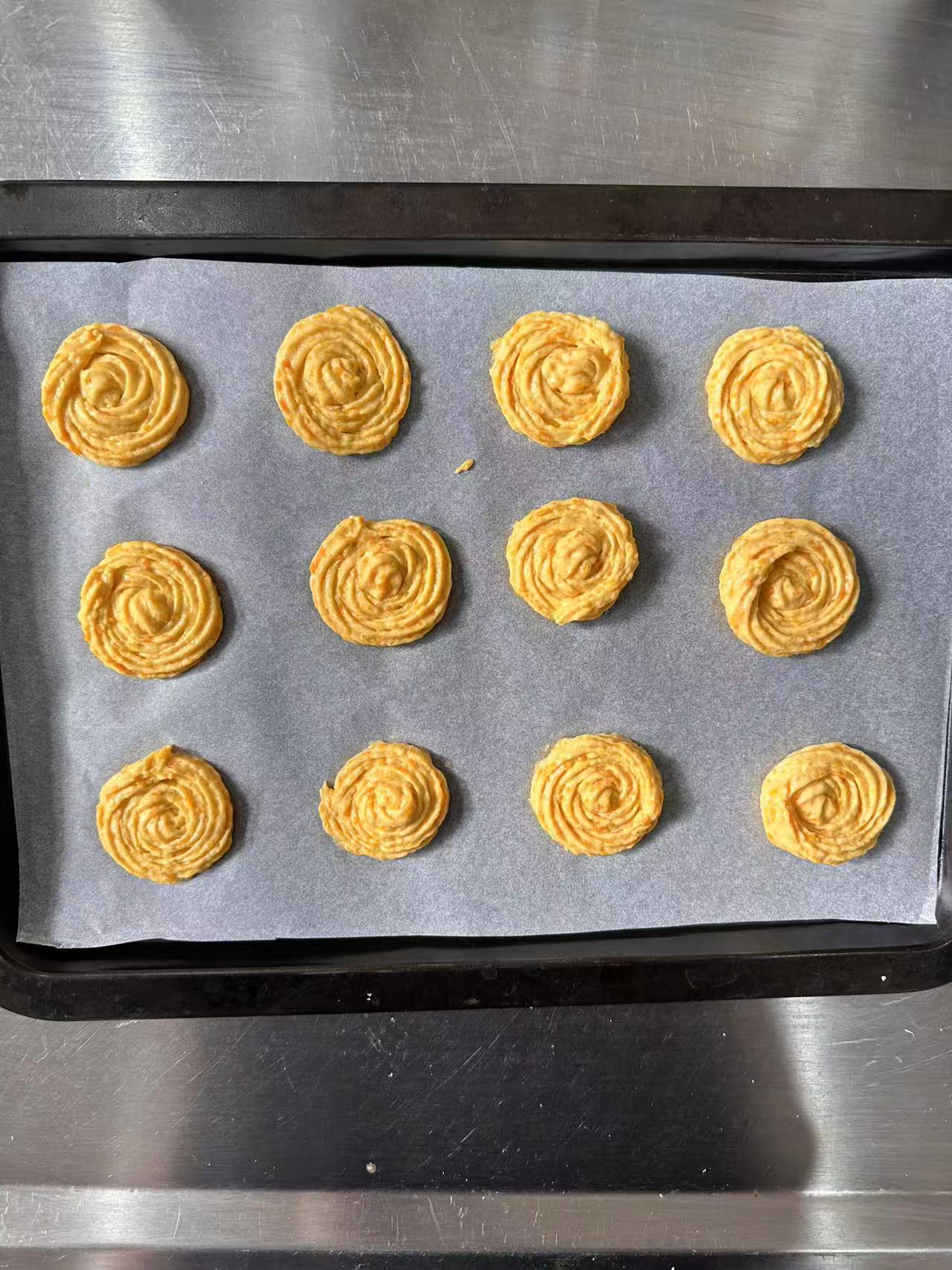 Piped sweet potato biscuits ready for baking