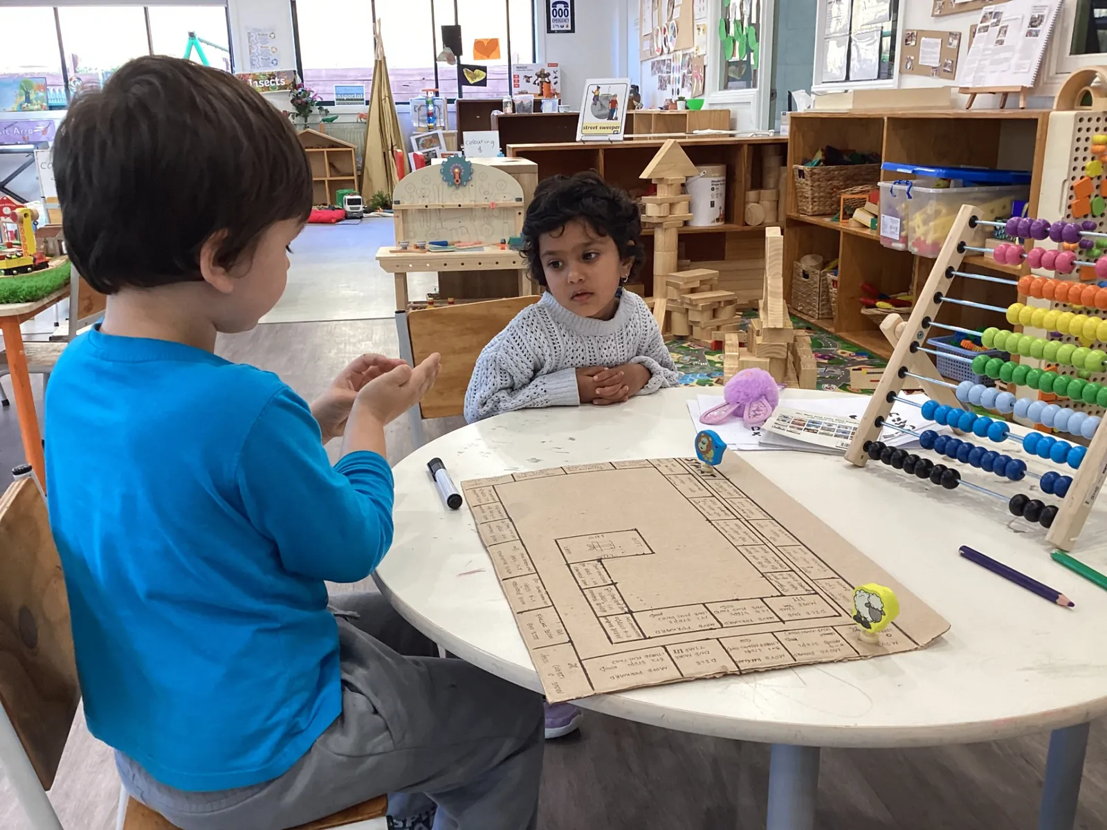 Collaborative board game – reasoning and turn-taking