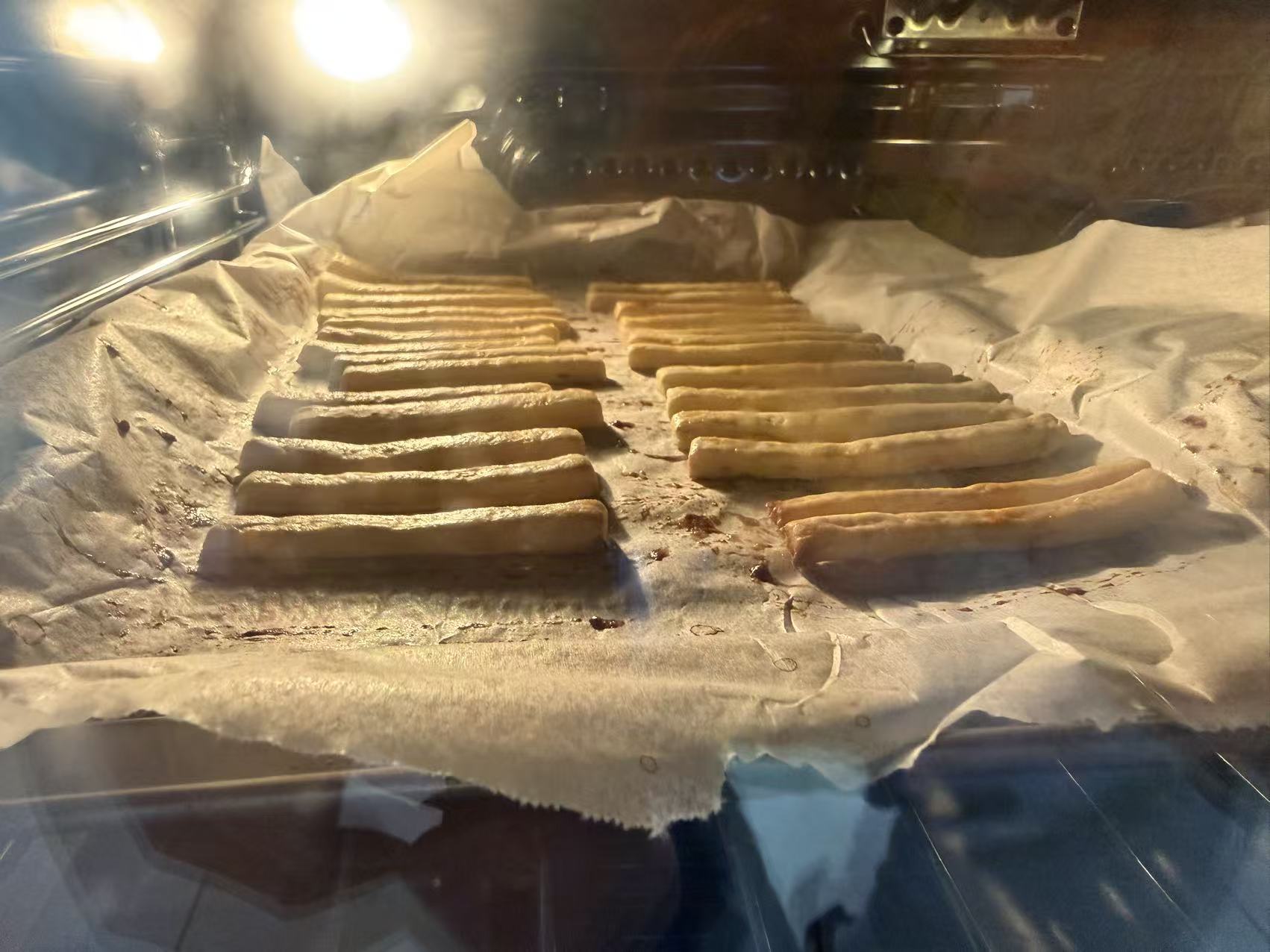 Homemade sweet potato crackers baking in the oven