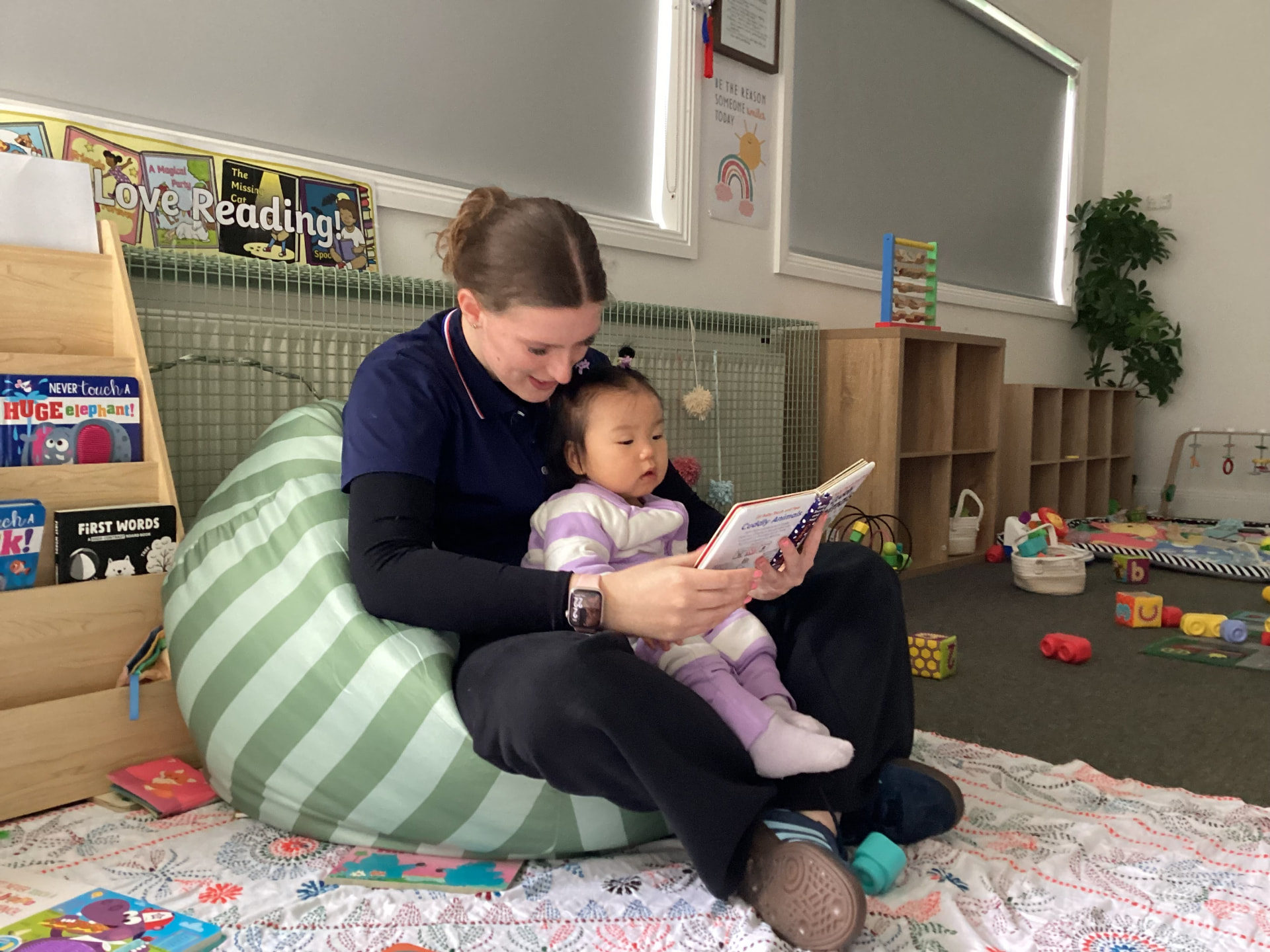 Reading together in the baby room