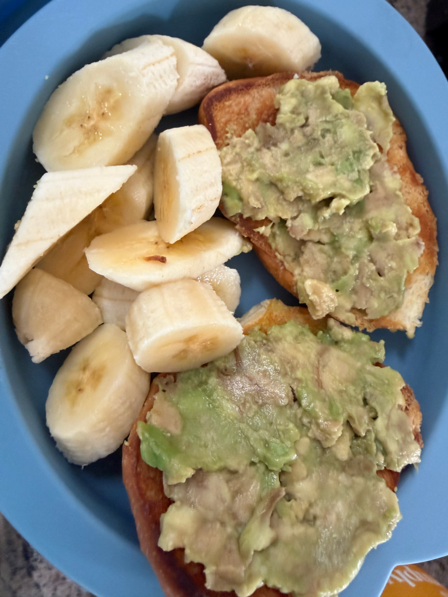 Avocado toast with fresh banana slices